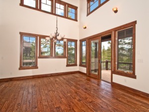 Spacious empty room with wooden floor