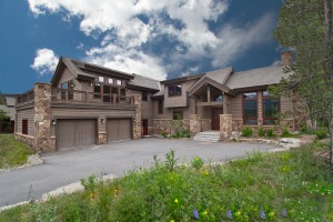 Modern rustic house with stone accents.