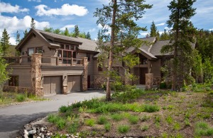 Modern mountain home with stone and wood accents