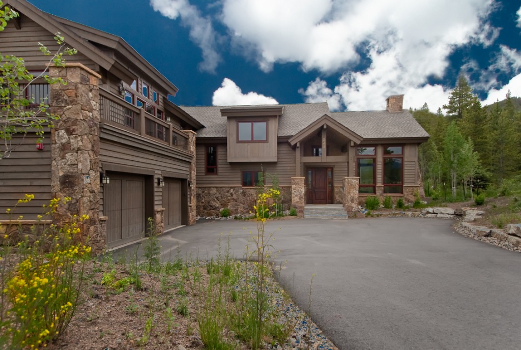 Rustic mountain home with stone accents