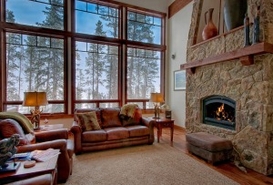 Cozy living room with fireplace and large windows