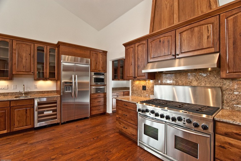 Modern kitchen with wood cabinets and stainless appliances