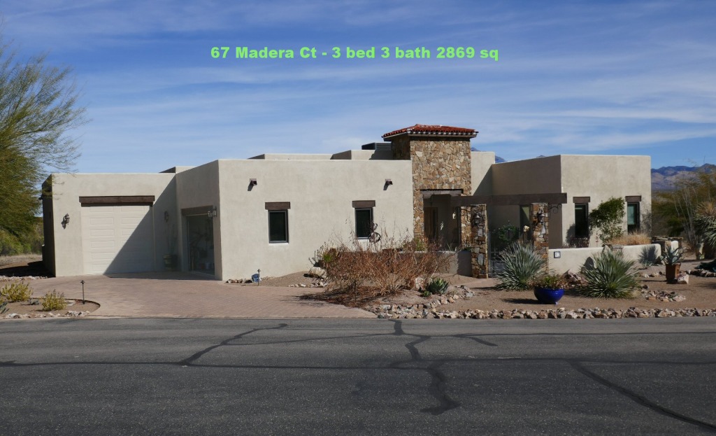 Contemporary desert home exterior with garage